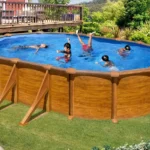 Mauritius ovaler Stahlpool mit Holzoptik, 6,34 x 3,99 x 1,32 m - Grau